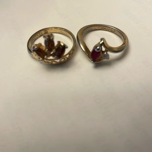 2 Gold Rings  with precious stones